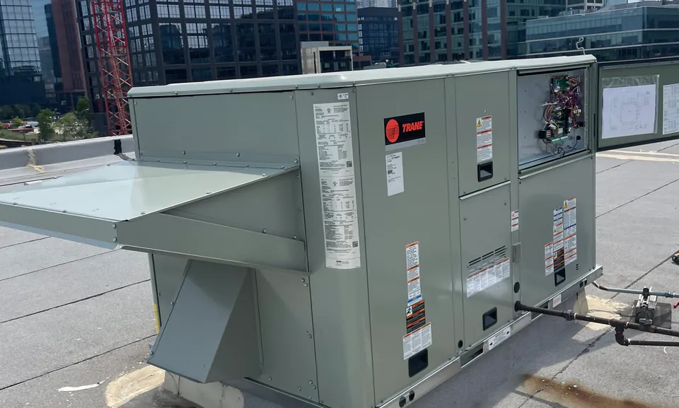 Commercial rooftop HVAC unit on a business building in Worth, IL